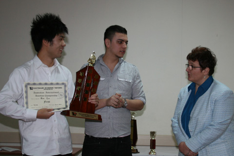Bin Lu trophy presentation for winning the top international IO253 category
