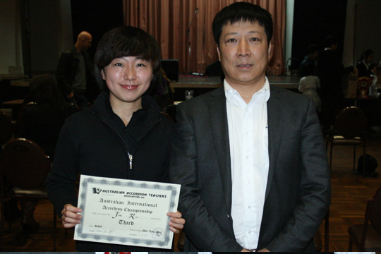 Jia Ru with her teacher Wang Hongyu.