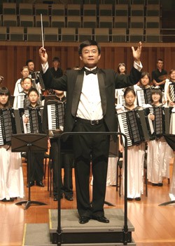 Baidi Accordion Orchestra conductor Chen Weiliang